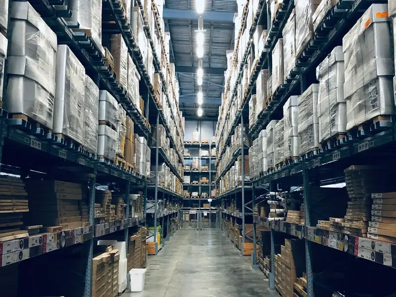 Cartons on warehouse racking after final UK delivery